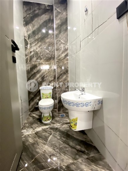 Large two-level apartment 5+1, with a total area of 395 m2, in the prestigious area of Alanya - Hasbahce-id-7730-photo-17