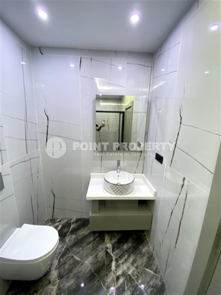 Large two-level apartment 5+1, with a total area of 395 m2, in the prestigious area of Alanya - Hasbahce-id-7730-photo-18