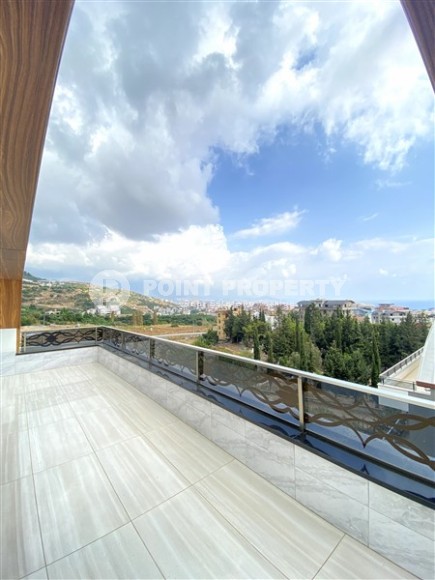 Large two-level apartment 5+1, with a total area of 395 m2, in the prestigious area of Alanya - Hasbahce-id-7730-photo-19