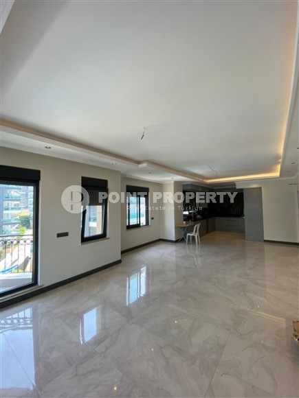 New two-level 3+1 apartment in an elite residential complex with a “city within a city” infrastructure, in a quiet area of Alanya - Kargicak-id-7733-photo-2