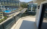 New two-level 3+1 apartment in an elite residential complex with a “city within a city” infrastructure, in a quiet area of Alanya - Kargicak-id-7733-photo-15