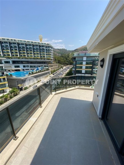 New two-level 3+1 apartment in an elite residential complex with a “city within a city” infrastructure, in a quiet area of Alanya - Kargicak-id-7733-photo-15