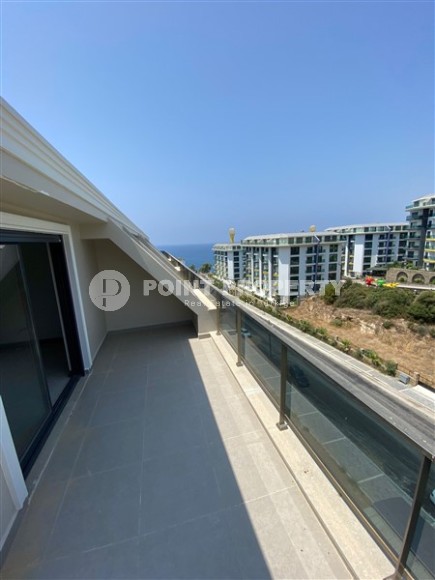 New two-level 3+1 apartment in an elite residential complex with a “city within a city” infrastructure, in a quiet area of Alanya - Kargicak-id-7733-photo-16