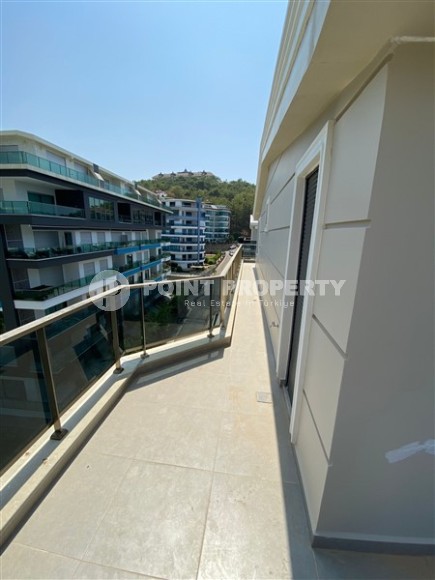 New two-level 3+1 apartment in an elite residential complex with a “city within a city” infrastructure, in a quiet area of Alanya - Kargicak-id-7733-photo-17
