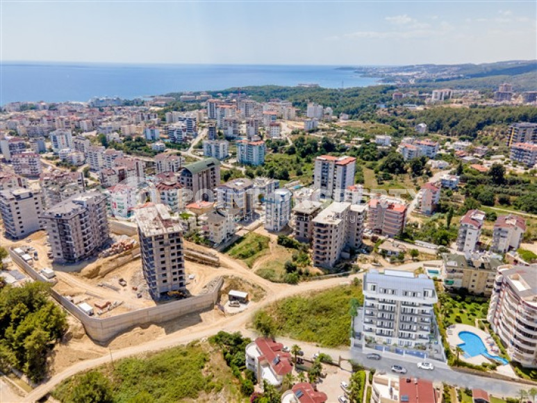 Investment project with minimal infrastructure in Avsallar from a construction company, Alanya-id-1597-photo-8