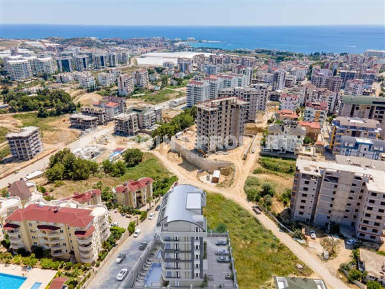 Investment project with minimal infrastructure in Avsallar from a construction company, Alanya-id-1597-photo-10