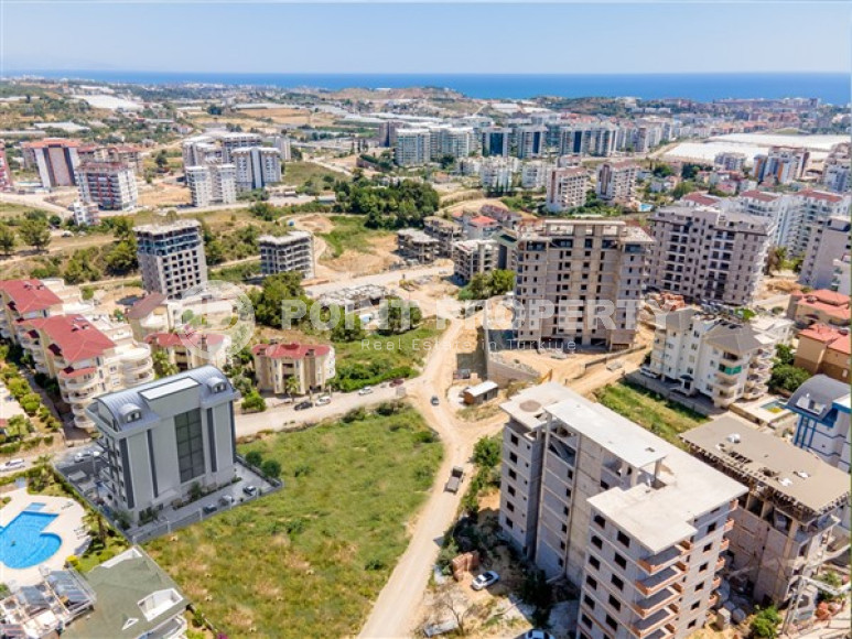 Investment project with minimal infrastructure in Avsallar from a construction company, Alanya-id-1597-photo-11