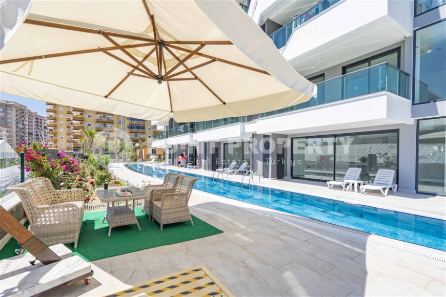 Атмосферная линейная квартира с видом на море и живописную банановую рощу, в престижном районе Аланьи - Каргыджак-id-7738-фото-25