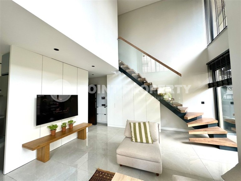 Современный лофт с просторной гостиной и одной спальной комнатой, в 150 метрах от знаменитого пляжа Клеопатры-id-7741-фото-3