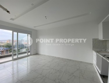 Compact 1+1 apartment, with a total area of 55 m2, in a promising area of Alanya - Avsallar-id-7748-photo-3