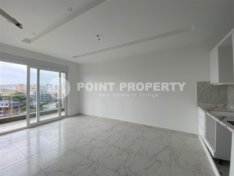 Compact 1+1 apartment, with a total area of 55 m2, in a promising area of Alanya - Avsallar-id-7748-photo-3