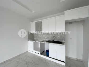 Compact 1+1 apartment, with a total area of 55 m2, in a promising area of Alanya - Avsallar-id-7748-photo-4