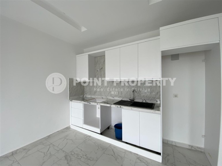 Compact 1+1 apartment, with a total area of 55 m2, in a promising area of Alanya - Avsallar-id-7748-photo-4