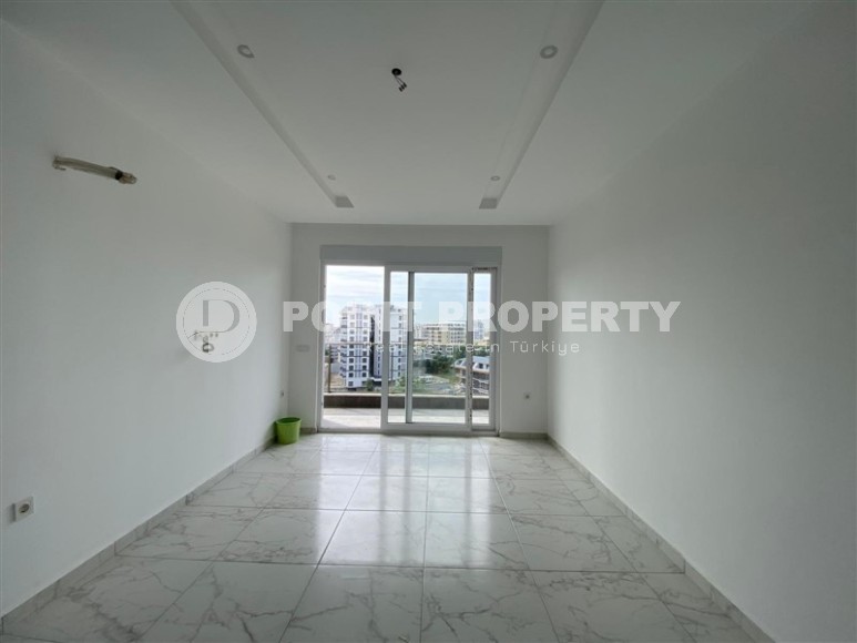 Compact 1+1 apartment, with a total area of 55 m2, in a promising area of Alanya - Avsallar-id-7748-photo-5