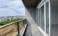 Compact 1+1 apartment, with a total area of 55 m2, in a promising area of Alanya - Avsallar-id-7748-photo-11