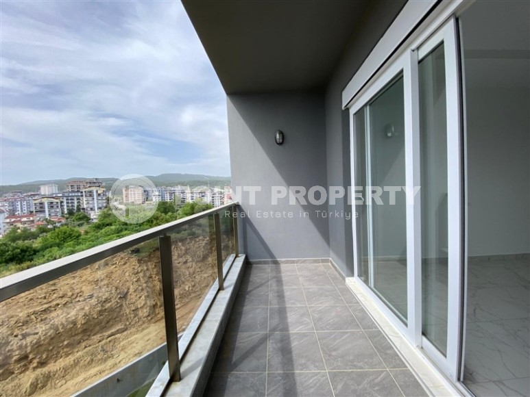 Compact 1+1 apartment, with a total area of 55 m2, in a promising area of Alanya - Avsallar-id-7748-photo-11