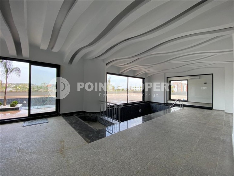 Compact 1+1 apartment, with a total area of 55 m2, in a promising area of Alanya - Avsallar-id-7748-photo-14