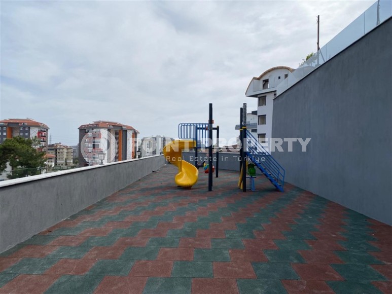 Compact 1+1 apartment, with a total area of 55 m2, in a promising area of Alanya - Avsallar-id-7748-photo-17