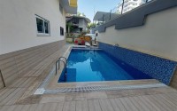 Inexpensive furnished apartment with a top location 200 meters from the sea, in the center of Mahmutlar-id-7749-photo-14