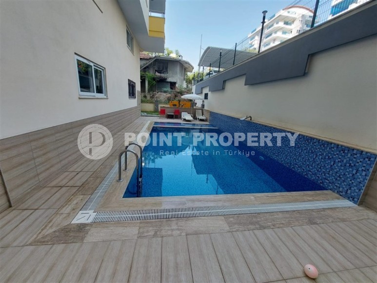 Inexpensive furnished apartment with a top location 200 meters from the sea, in the center of Mahmutlar-id-7749-photo-14