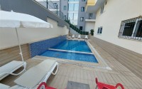 Inexpensive furnished apartment with a top location 200 meters from the sea, in the center of Mahmutlar-id-7749-photo-15