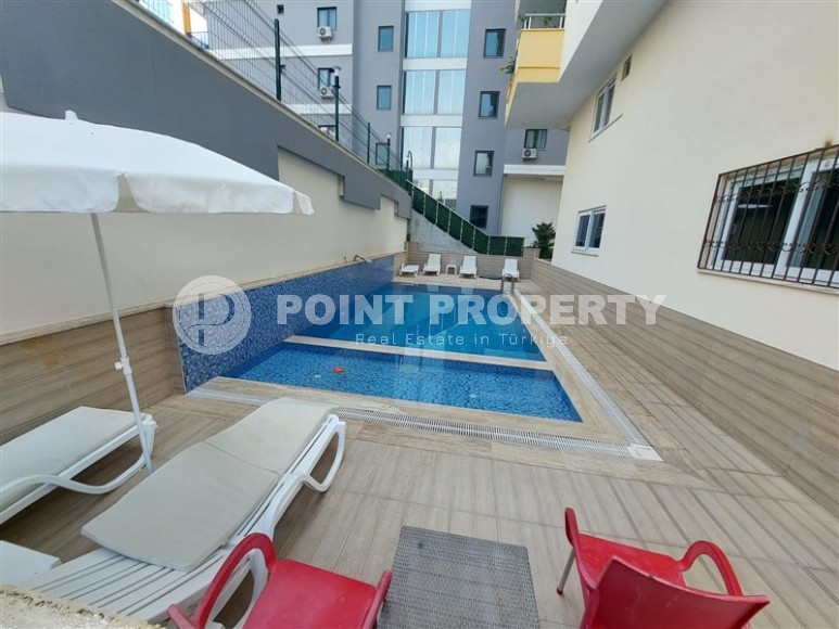 Inexpensive furnished apartment with a top location 200 meters from the sea, in the center of Mahmutlar-id-7749-photo-15
