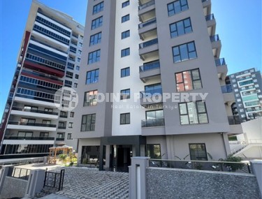 Новая квартира 2+1, общей площадью 75 м2, в современном районе Аланьи - Махмутлар-id-7753-фото-1