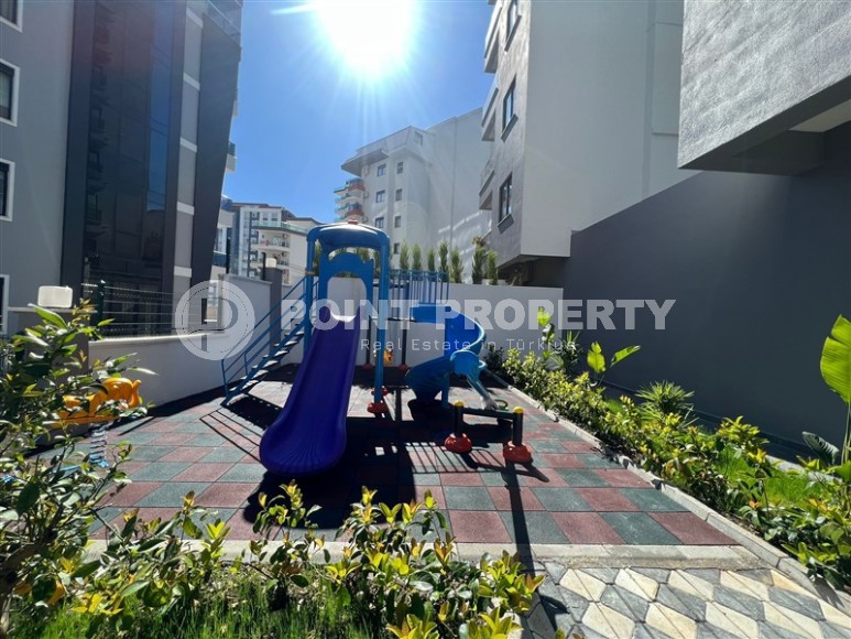 New apartment 2+1, with a total area of 75 m2, in the modern area of Alanya - Mahmutlar-id-7753-photo-13