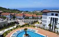 View apartments 2+1 and 3+1 in a large complex from a famous developer, Kargicak-id-1085-photo-19