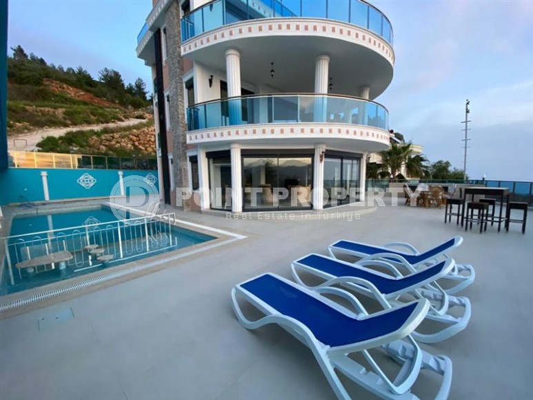 Отдельно стоящая трехэтажная вилла с бассейном и садовым участком, в живописном районе Аланьи - Кестель-id-7757-фото-3