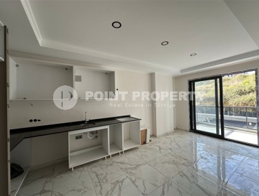 Small apartment 1+1, with a total area of 50 m2, in a residential complex at the final stage of construction-id-7758-photo-4