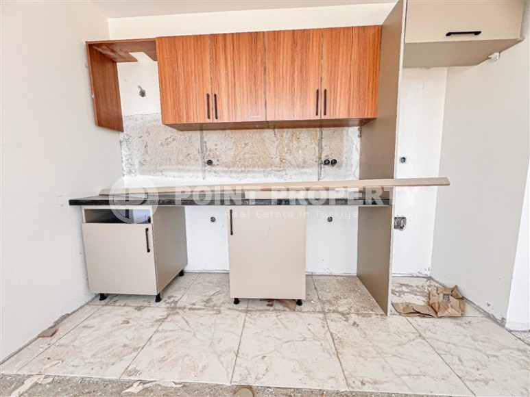 Apartment 1+1 on the 5th floor in a residential complex under construction, 2250 meters from the sea-id-7760-photo-3