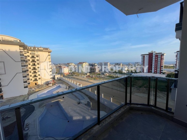 Apartment 1+1 on the 5th floor in a residential complex under construction, 2250 meters from the sea-id-7760-photo-7