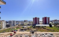 Apartment 1+1 on the 5th floor in a residential complex under construction, 2250 meters from the sea-id-7760-photo-8