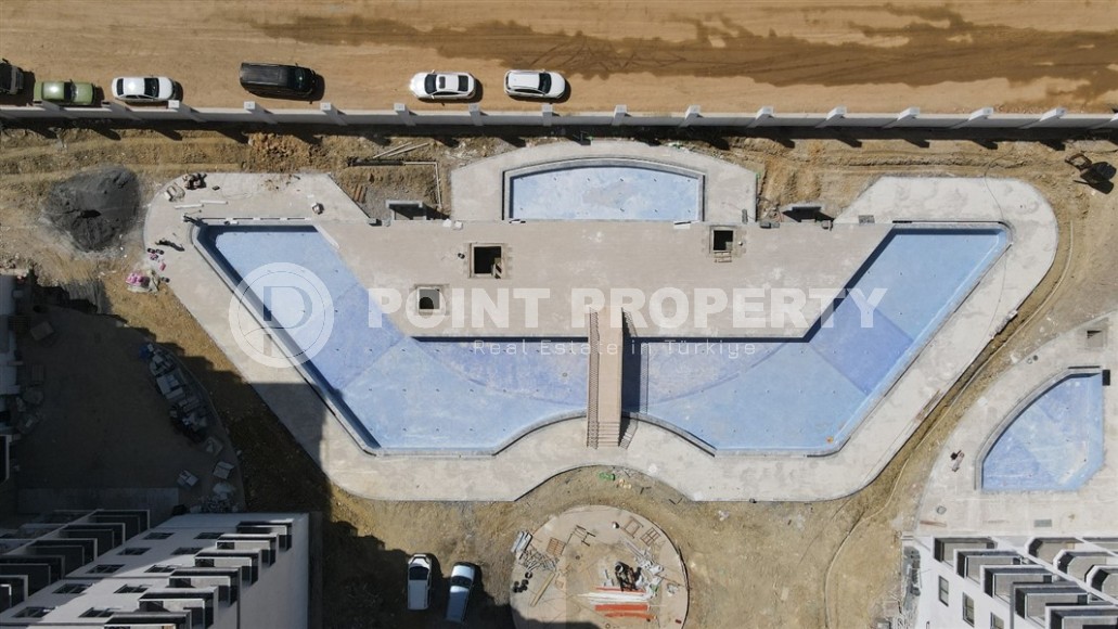 Apartment 1+1 on the 5th floor in a residential complex under construction, 2250 meters from the sea-id-7760-photo-13