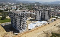 Apartment 1+1 on the 5th floor in a residential complex under construction, 2250 meters from the sea-id-7760-photo-15