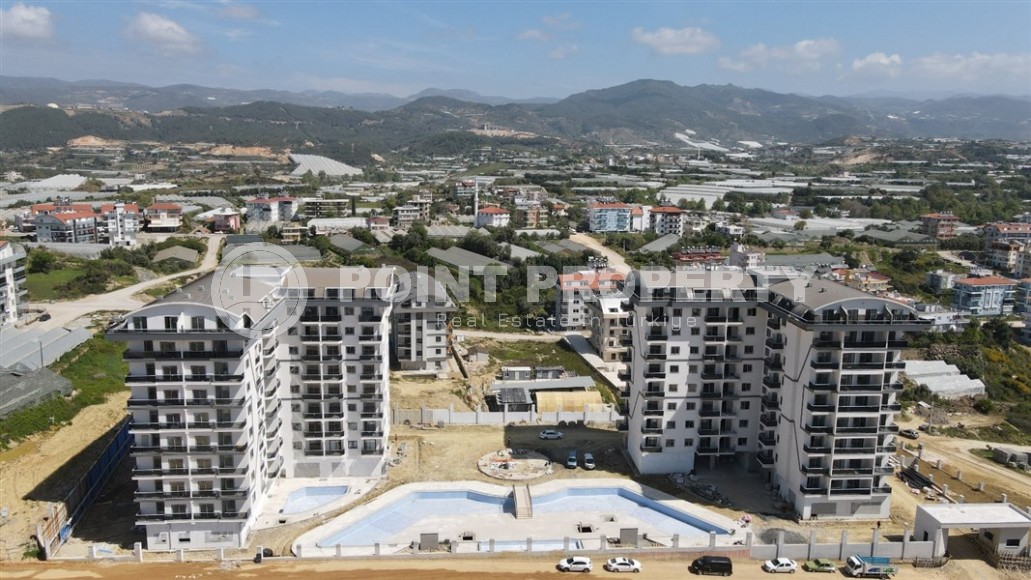 Apartment 1+1 on the 5th floor in a residential complex under construction, 2250 meters from the sea-id-7760-photo-16