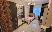 Three-room apartment, 110m², 150m from the sea in the center of Mahmutlar, Alanya-id-1601-photo-7