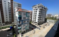 Affordable 1+1 apartment with a total area of 40 m2, with a top location within walking distance from the sea, in the center of Mahmutlar-id-7762-photo-7