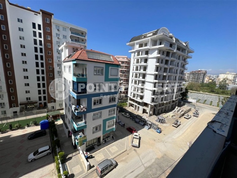 Affordable 1+1 apartment with a total area of 40 m2, with a top location within walking distance from the sea, in the center of Mahmutlar-id-7762-photo-7