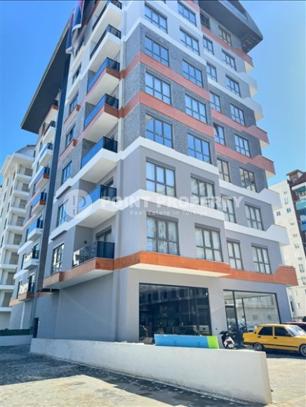 Affordable 1+1 apartment with a total area of 40 m2, with a top location within walking distance from the sea, in the center of Mahmutlar-id-7762-photo-11