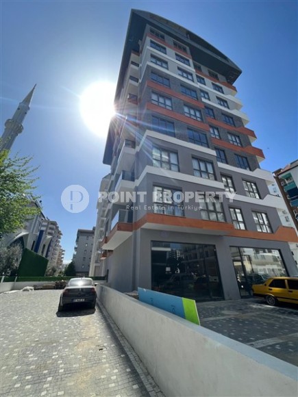 Affordable 1+1 apartment with a total area of 40 m2, with a top location within walking distance from the sea, in the center of Mahmutlar-id-7762-photo-12