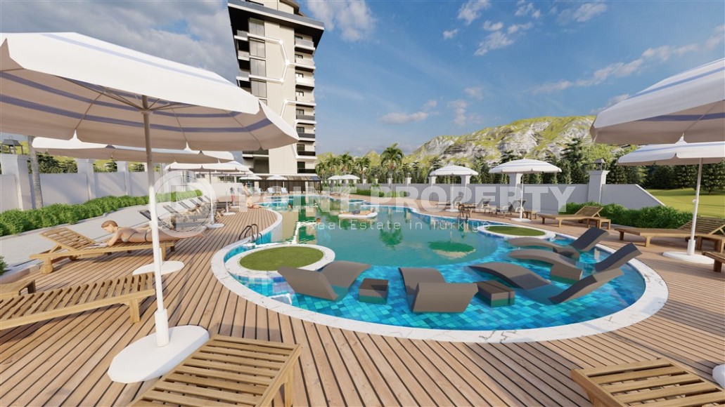 Линейные и двухуровневые квартиры в 8-этажном жилом комплексе на этапе строительства, в новом районе Аланьи - Паяллар-id-7764-фото-7