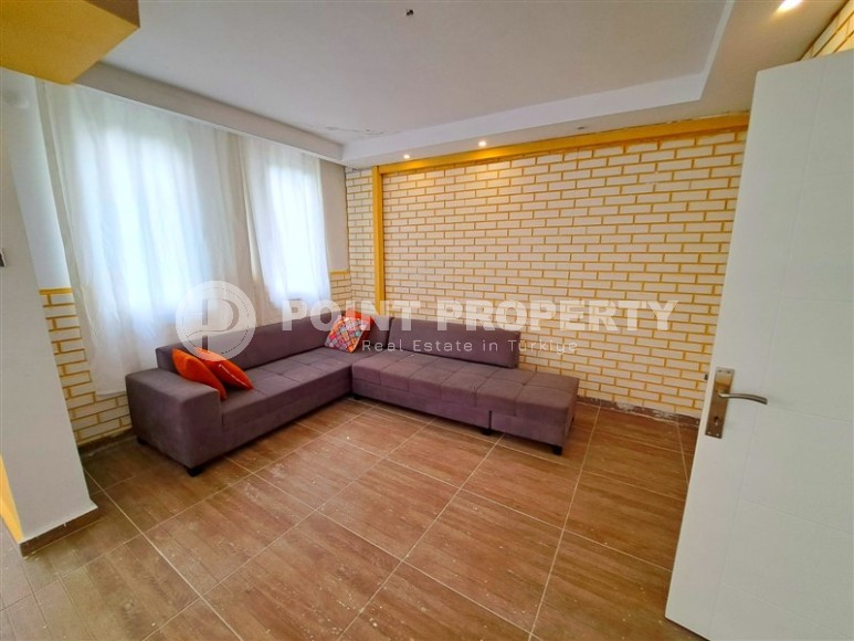 Advantageous offer - inexpensive apartment with high-quality renovation, on the 1st floor in the center of Mahmutlar district-id-7765-photo-3
