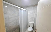 Advantageous offer - inexpensive apartment with high-quality renovation, on the 1st floor in the center of Mahmutlar district-id-7765-photo-12
