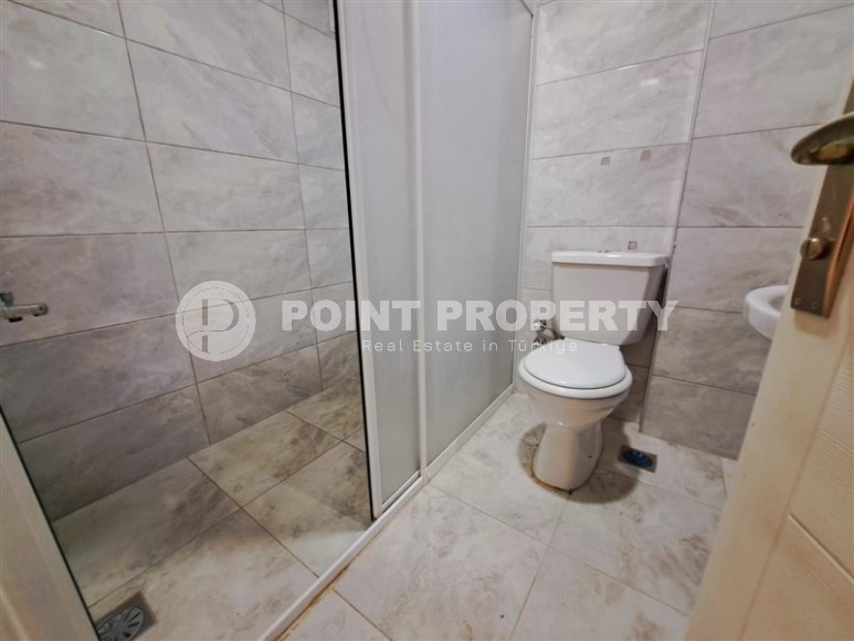 Advantageous offer - inexpensive apartment with high-quality renovation, on the 1st floor in the center of Mahmutlar district-id-7765-photo-13