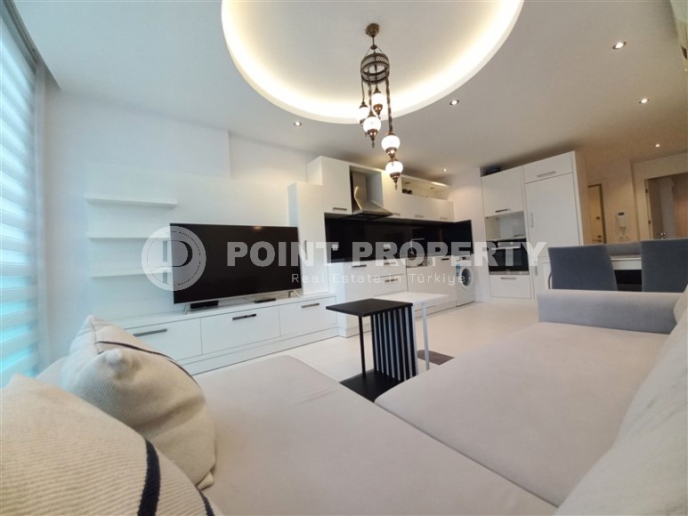 Современная квартира 2+1, общей площадью 70 м2, в трех минутах ходьбы от знаменитого пляжа Клеопатры-id-7769-фото-2