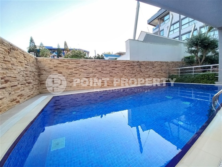 Современная квартира 2+1, общей площадью 70 м2, в трех минутах ходьбы от знаменитого пляжа Клеопатры-id-7769-фото-12