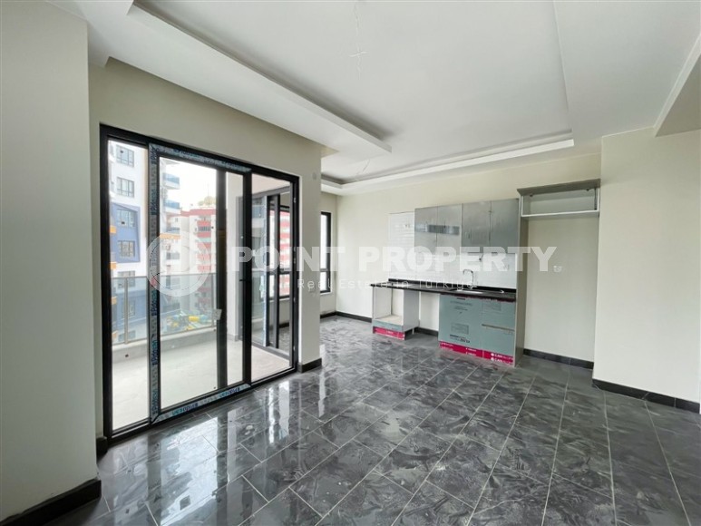 Small 1+1 apartment 800 meters from the sea, a short walk from the center of Mahmutlar-id-7774-photo-3