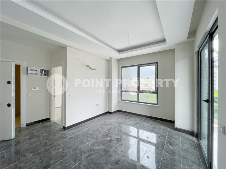 Small 1+1 apartment 800 meters from the sea, a short walk from the center of Mahmutlar-id-7774-photo-4